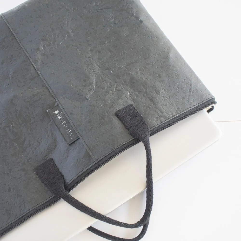 Water-resistant upcycled plastic laptop cover